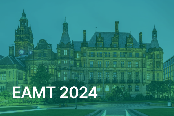 Illuminated historic building with 'EAMT 2024' text overlay, representing the European Association for Machine Translation event.